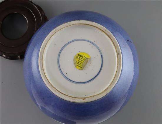 A Chinese powder blue globular jar, Kangxi period, H. 19cm, wood stand